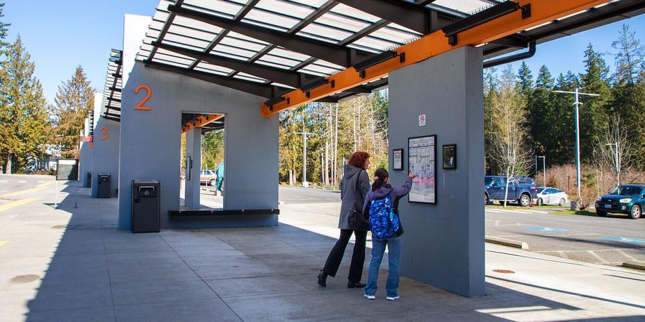 Pedestrians wayfinding at Kitsap Transit station.