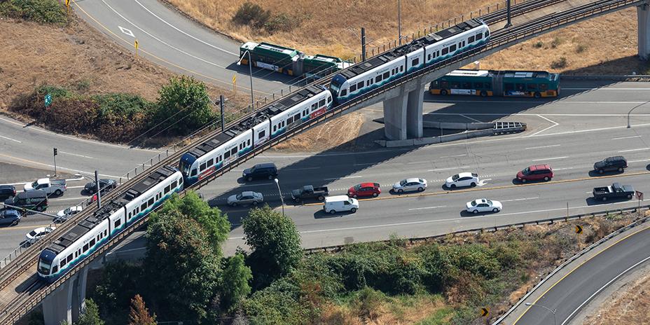 Link Light Rail passing over highway.